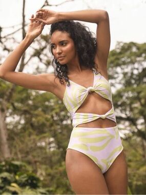 Amarelle - Ninia Purple Green One
Piece swimsuit BNWT tie purple green